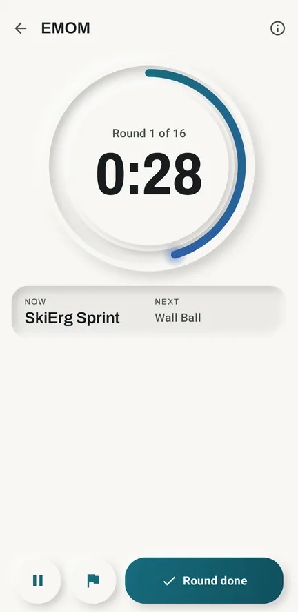 Kinoku EMOM timer in round 1 of 16, with 28 seconds left on a raised dial, SkiErg Sprint now and Wall Ball next, and a Round done button.