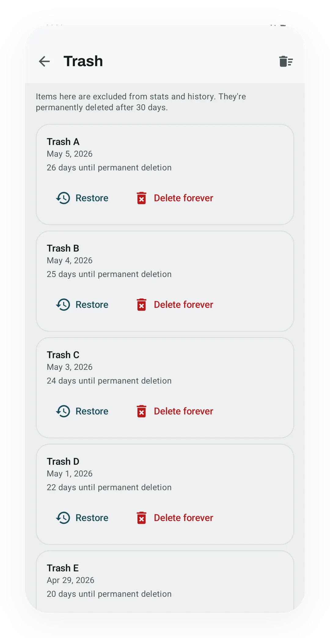 Kinoku Trash screen showing recoverable deleted workout items and restoration controls.